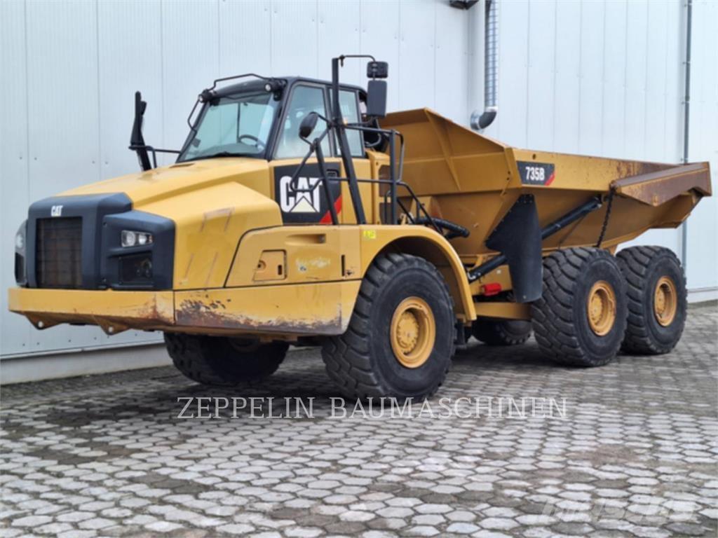 CAT 735B Шарнирно-сочленённые самосвалы