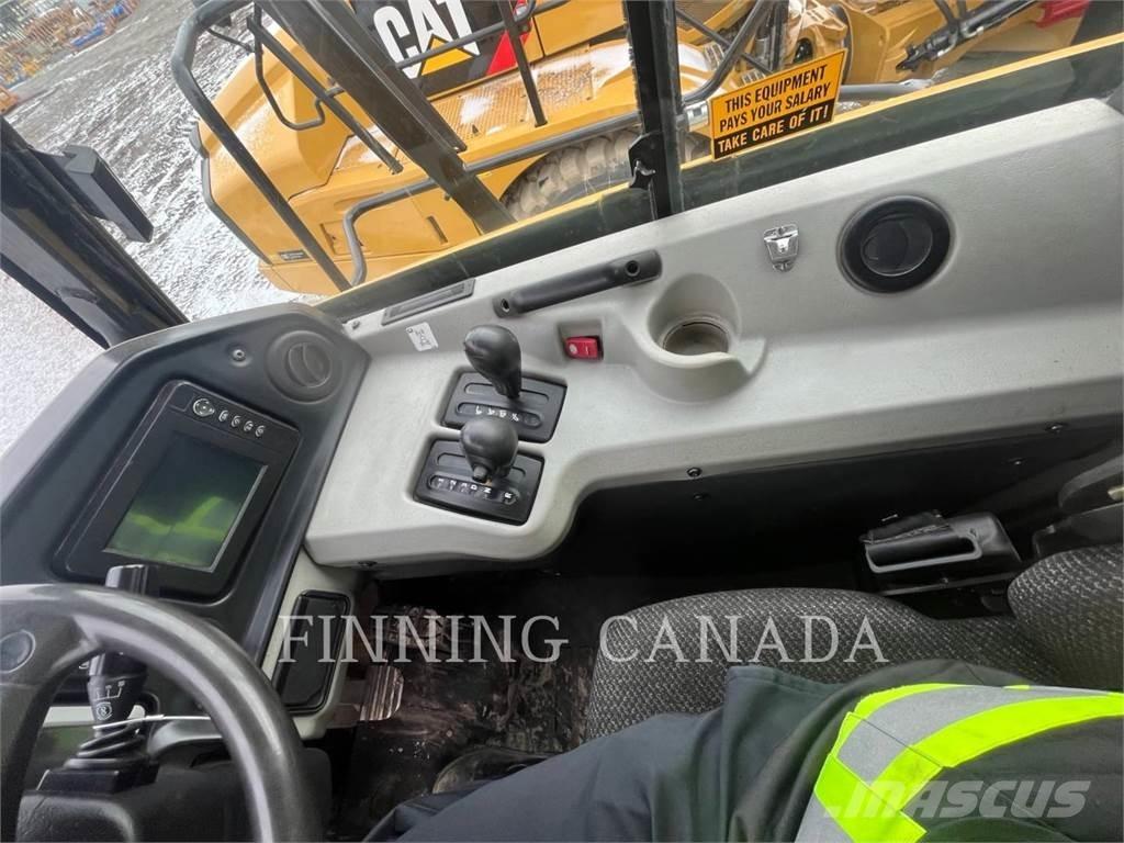 CAT 740B Шарнирно-сочленённые самосвалы