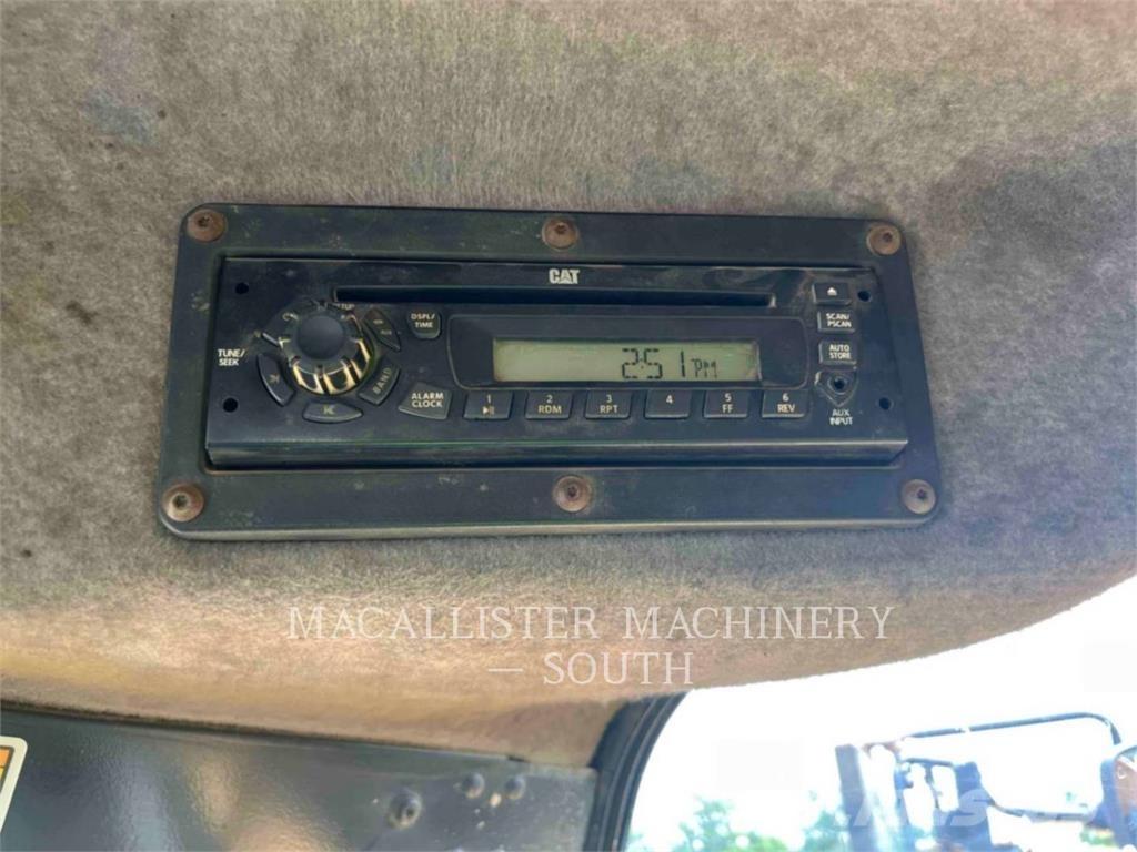 CAT 740B Шарнирно-сочленённые самосвалы
