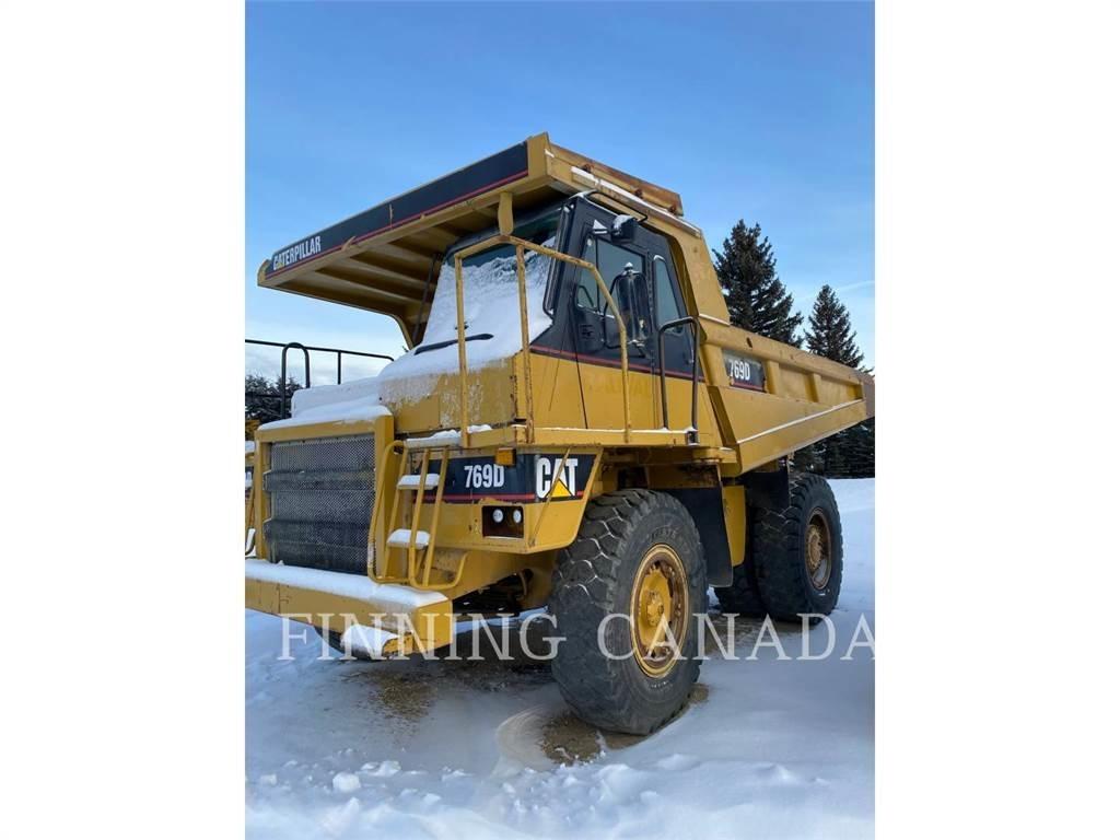 CAT 769D Шарнирно-сочленённые самосвалы