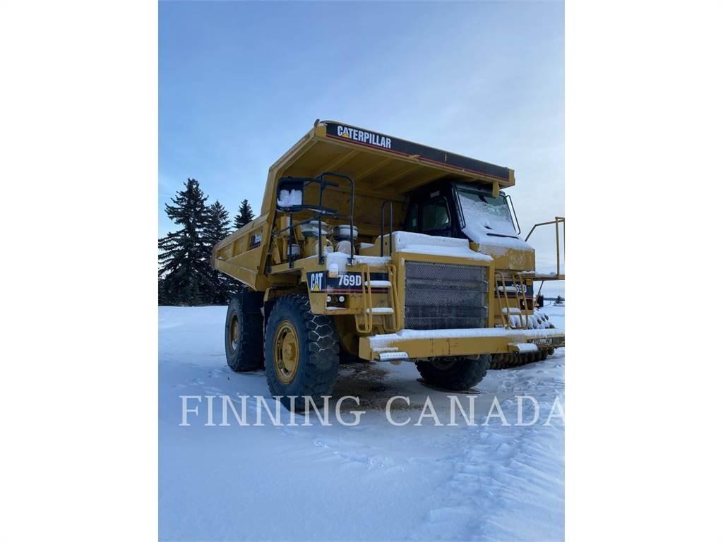 CAT 769D Шарнирно-сочленённые самосвалы