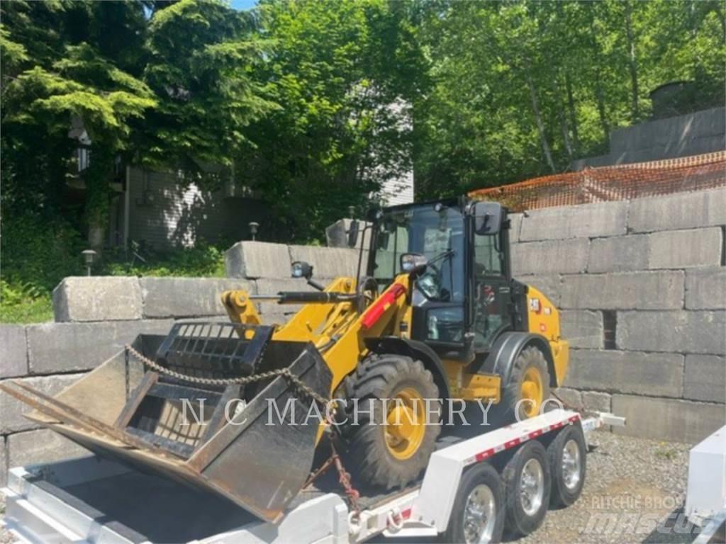 CAT 906 Фронтальные погрузчики
