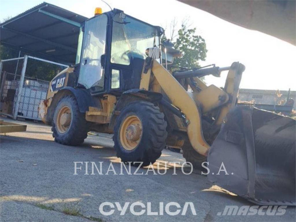 CAT 906H Фронтальные погрузчики