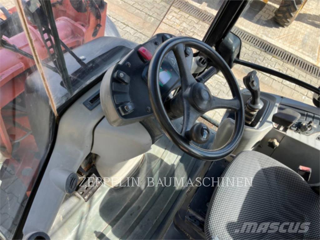 CAT 906H Фронтальные погрузчики