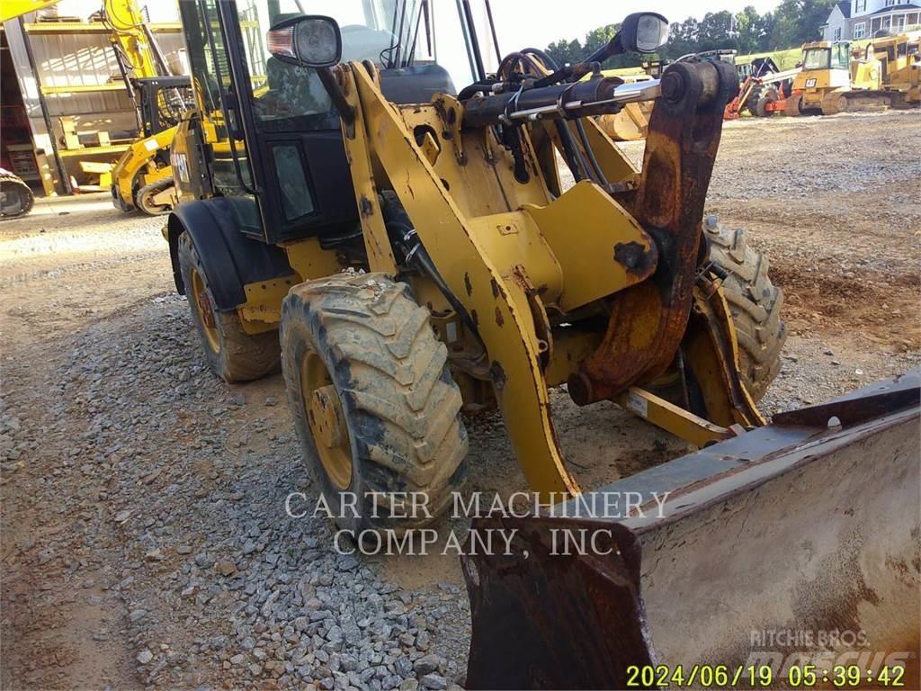 CAT 906M Фронтальные погрузчики