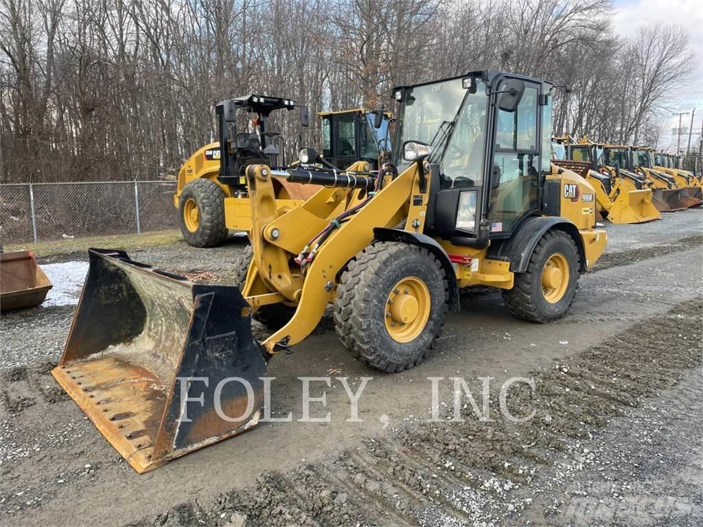 CAT 906M Фронтальные погрузчики