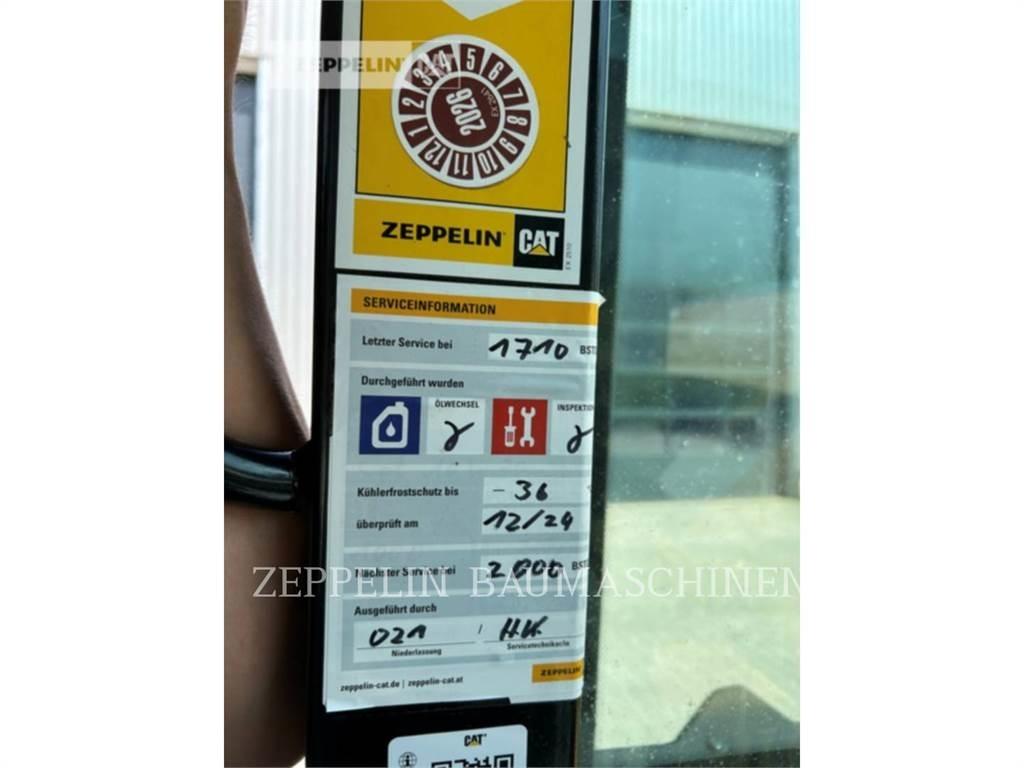 CAT 906M Фронтальные погрузчики