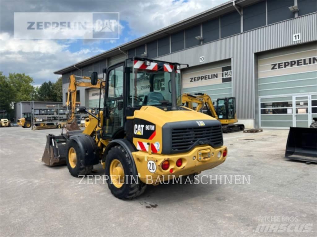 CAT 907M Фронтальные погрузчики