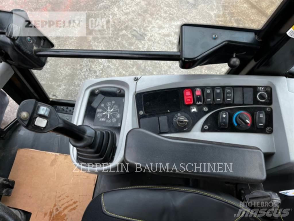 CAT 907M Фронтальные погрузчики