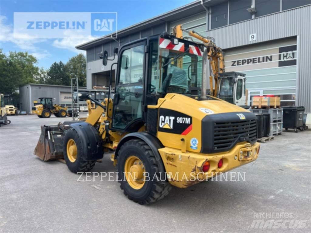 CAT 907M Фронтальные погрузчики
