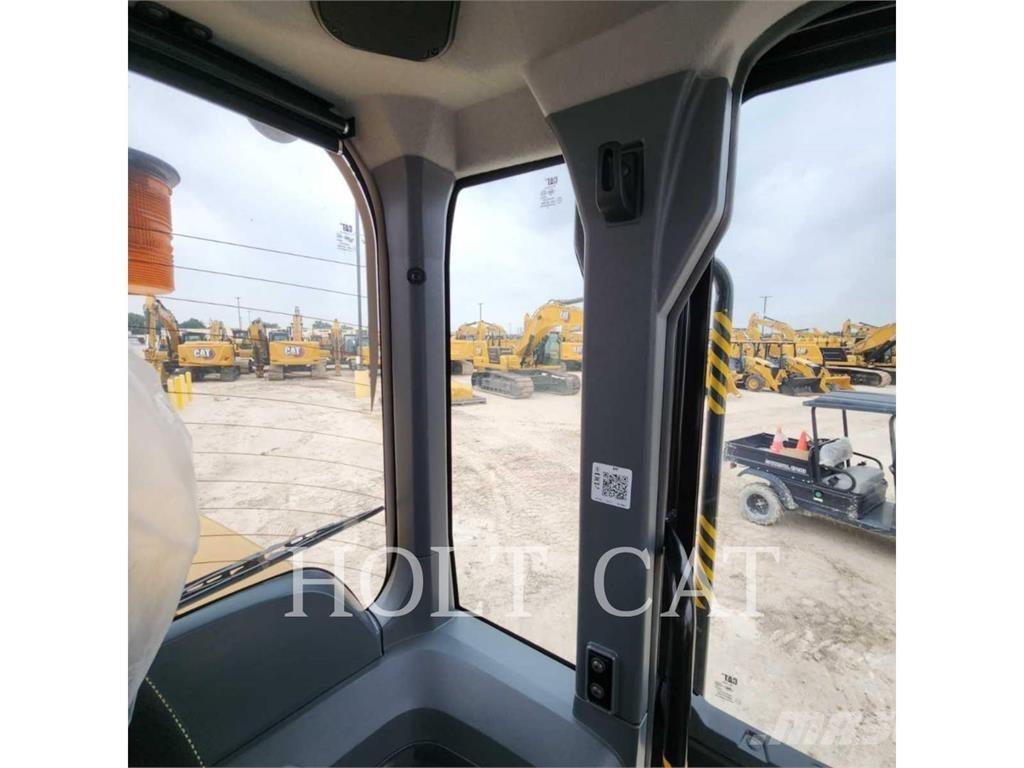 CAT 938 QC Фронтальные погрузчики