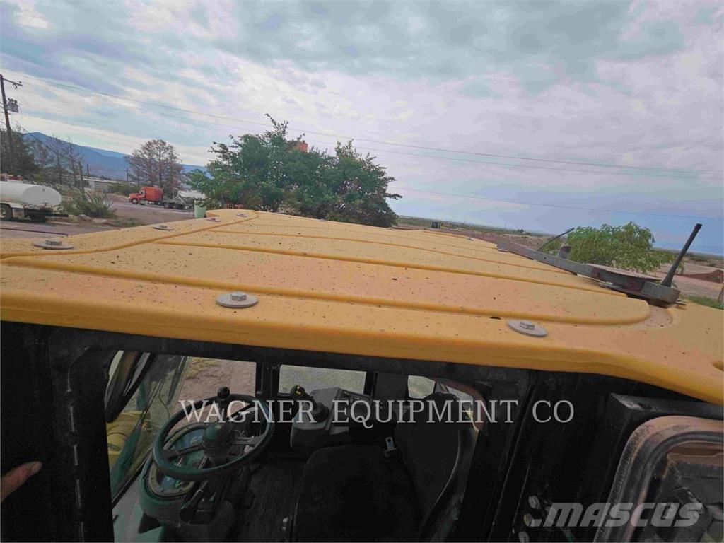 CAT 938H Фронтальные погрузчики