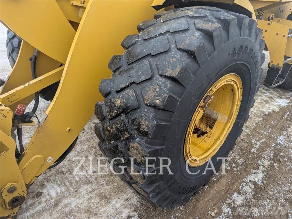 CAT 938M Фронтальные погрузчики