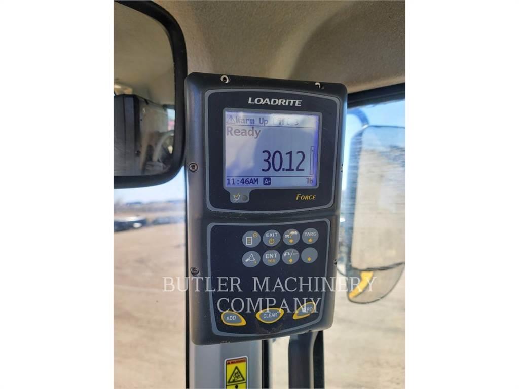CAT 938M Фронтальные погрузчики