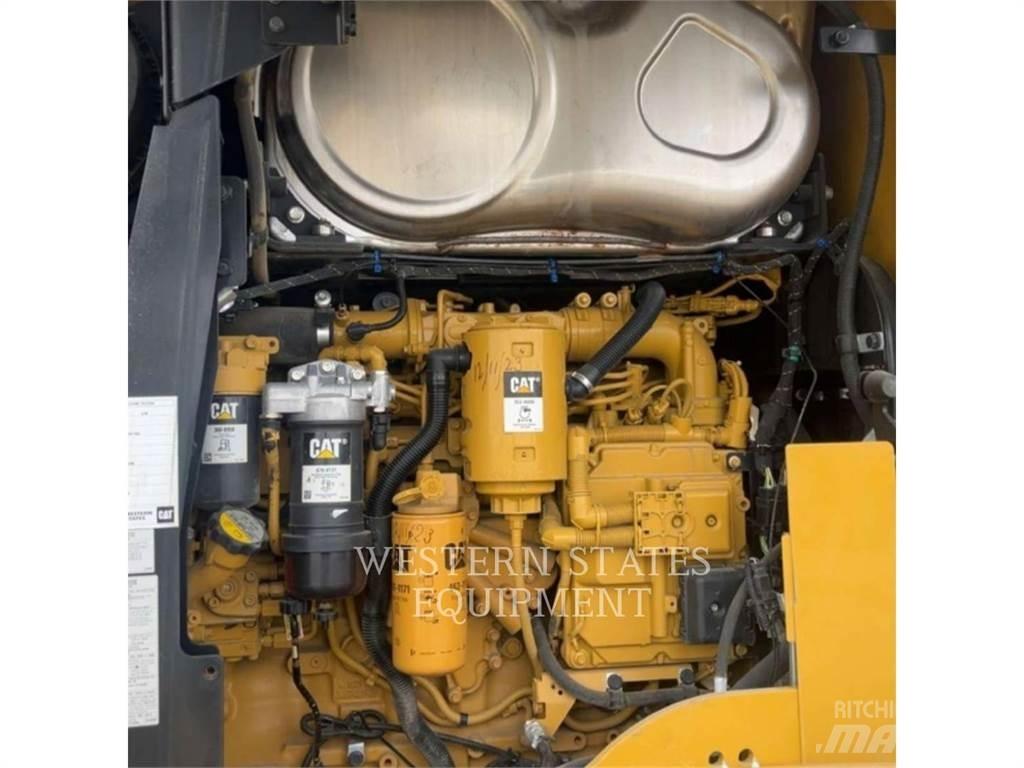 CAT 938M Фронтальные погрузчики