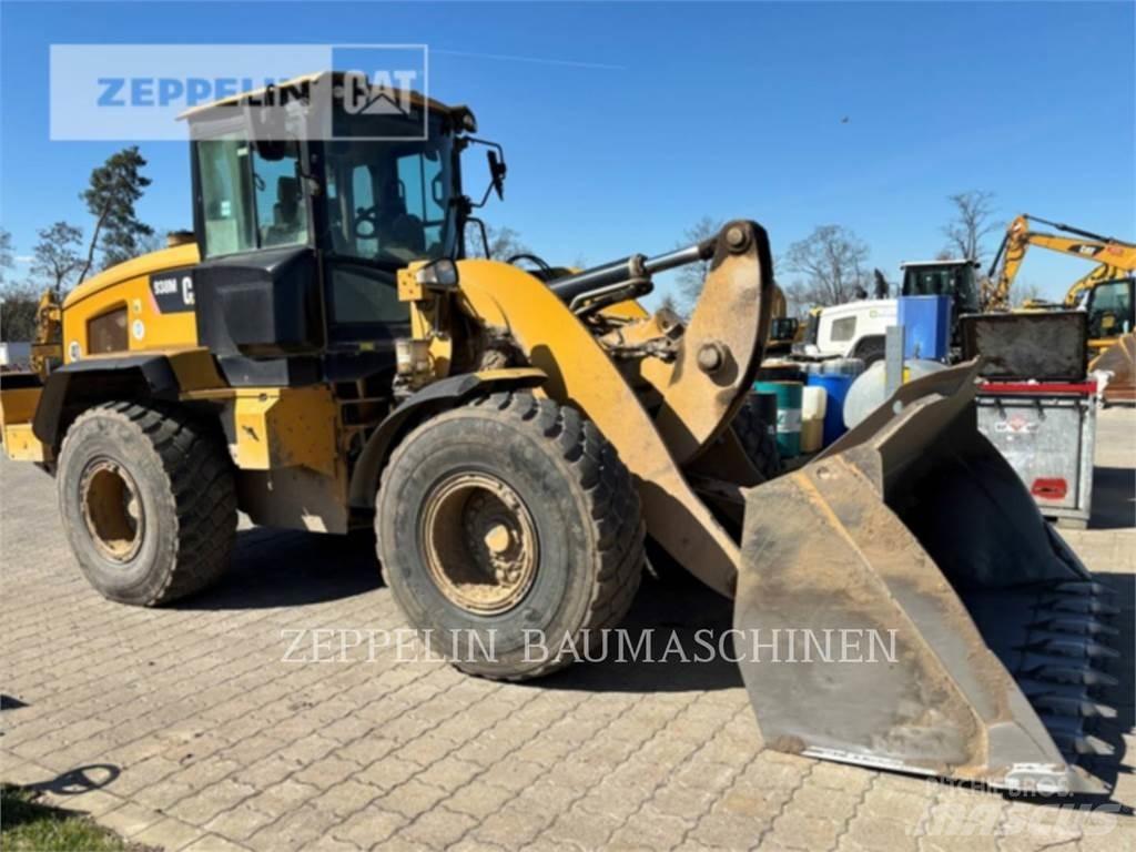 CAT 938M Фронтальные погрузчики