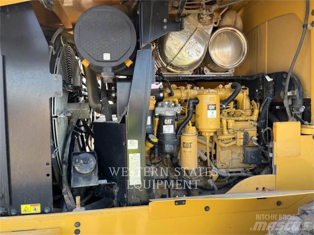CAT 938M Фронтальные погрузчики