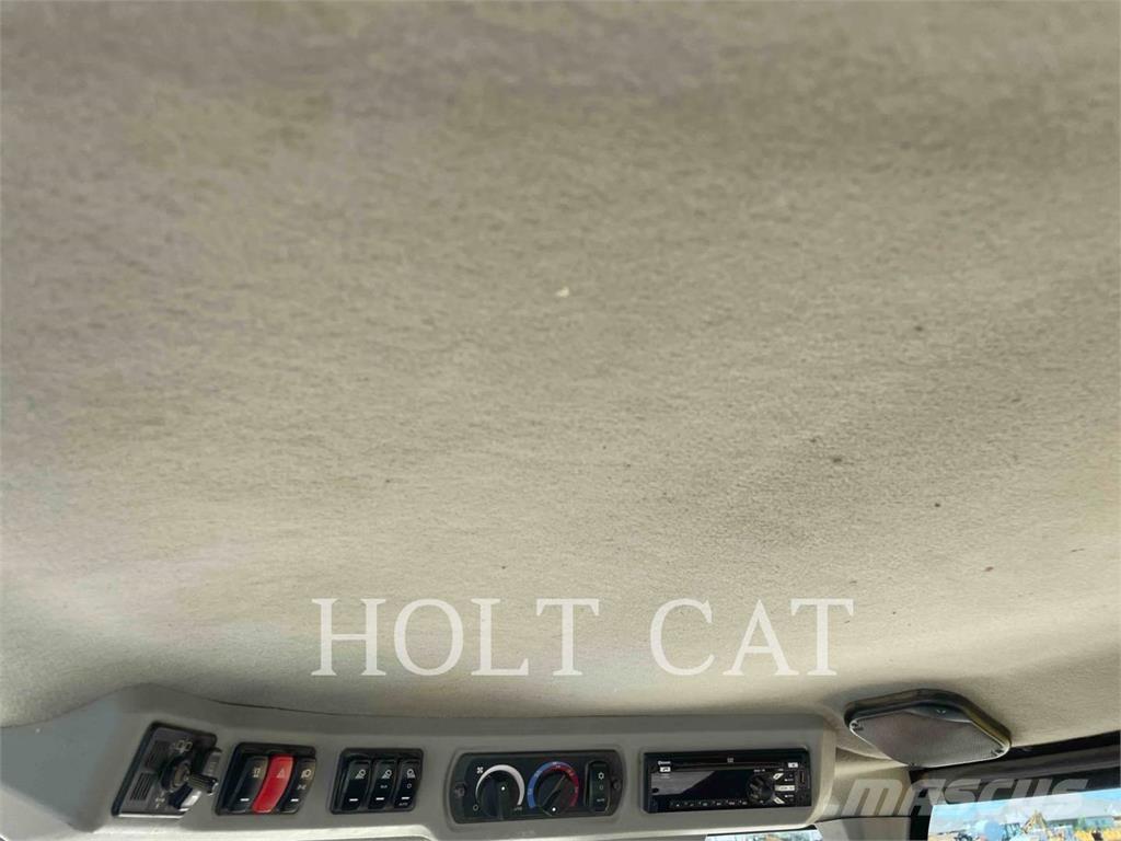 CAT 938M Фронтальные погрузчики