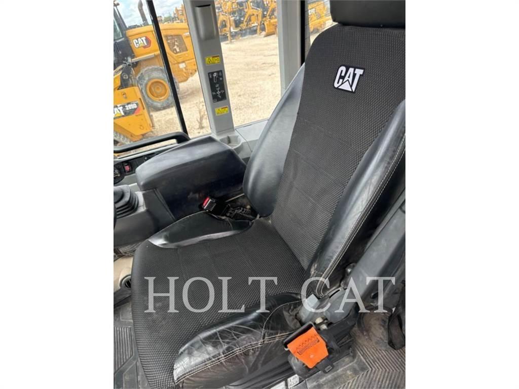 CAT 938M QC Фронтальные погрузчики