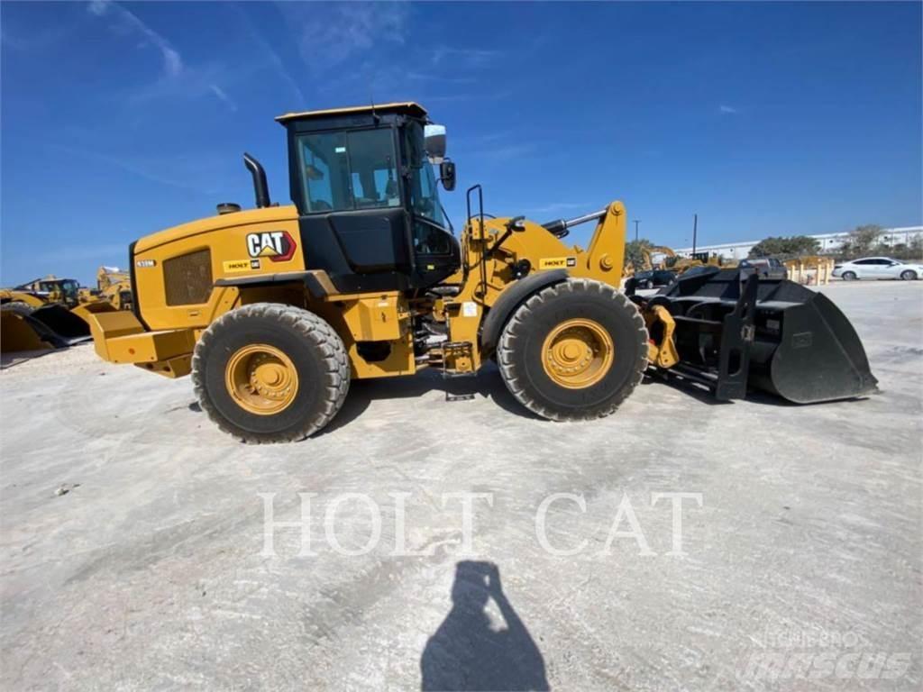 CAT 938M QC Фронтальные погрузчики