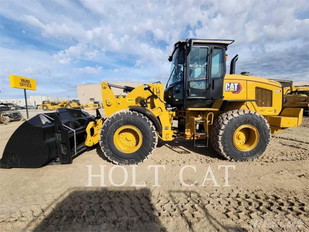 CAT 938M QC Фронтальные погрузчики