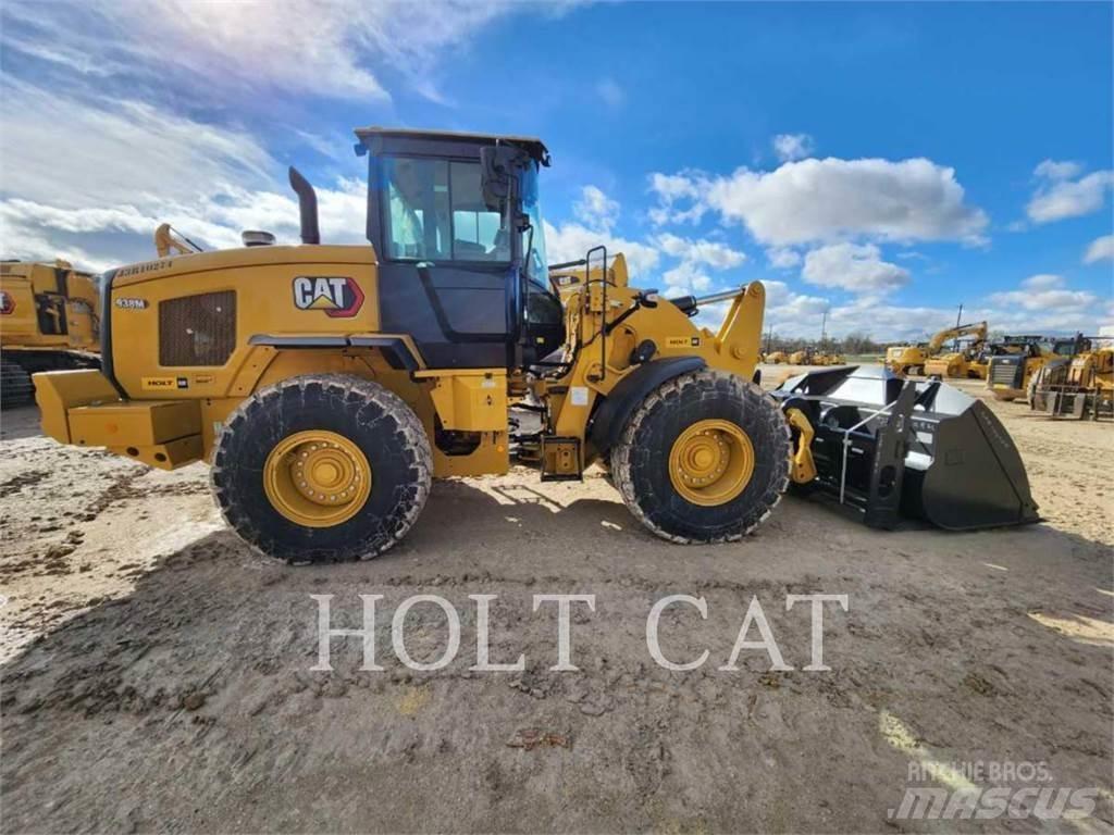 CAT 938M QC Фронтальные погрузчики