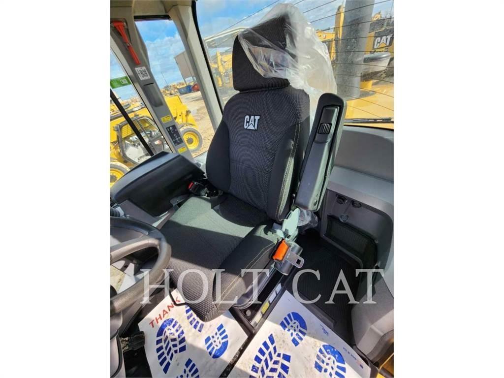 CAT 938M QC Фронтальные погрузчики
