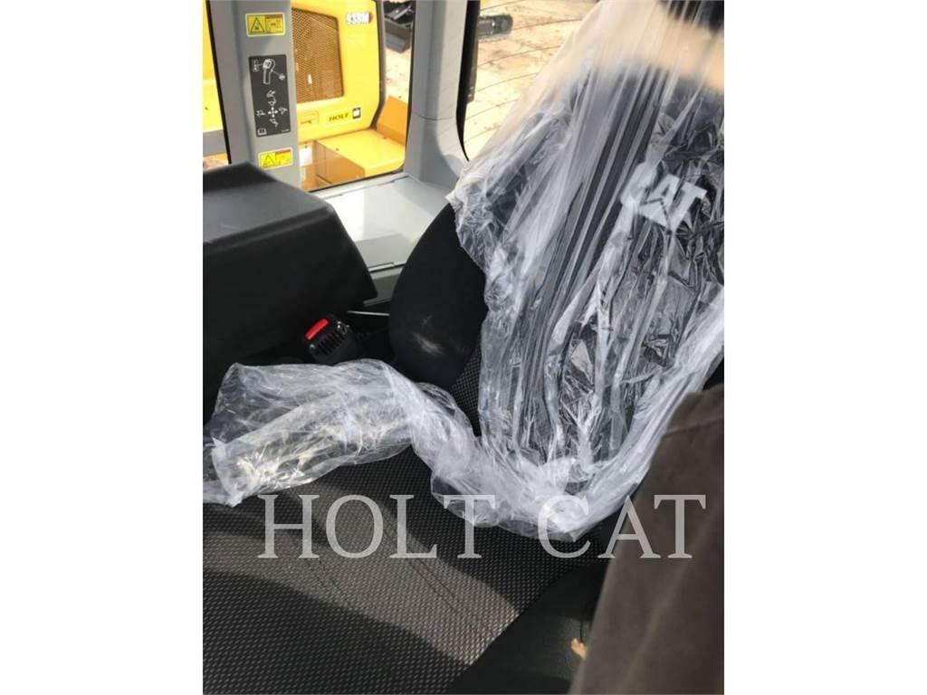 CAT 938M QC Фронтальные погрузчики