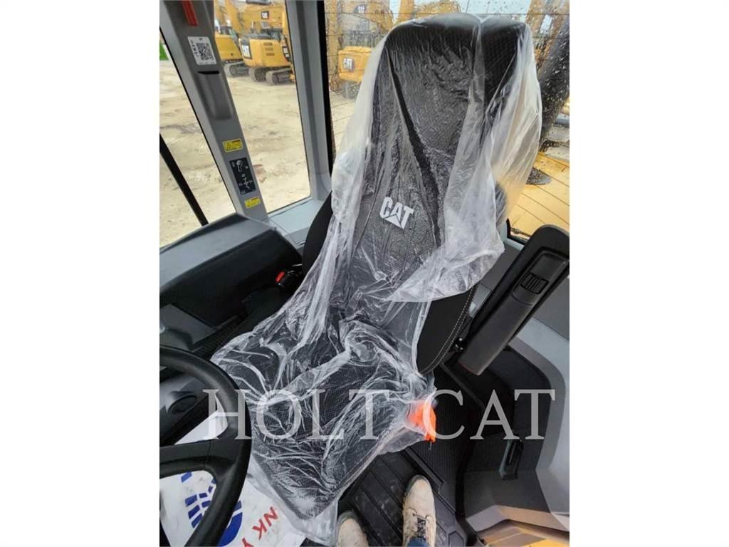 CAT 938M QC Фронтальные погрузчики