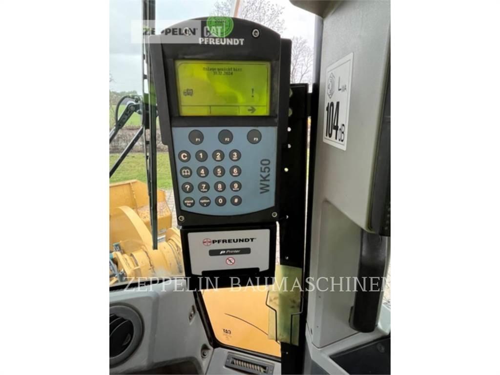 CAT 950M Фронтальные погрузчики