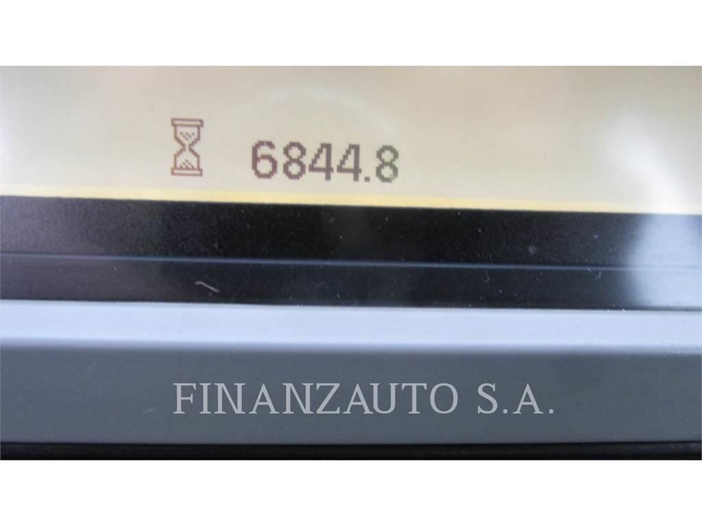 CAT 950M Фронтальные погрузчики