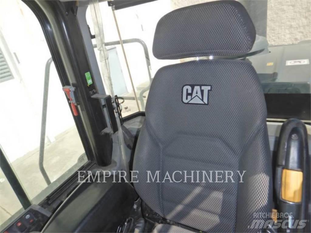 CAT 950M Фронтальные погрузчики