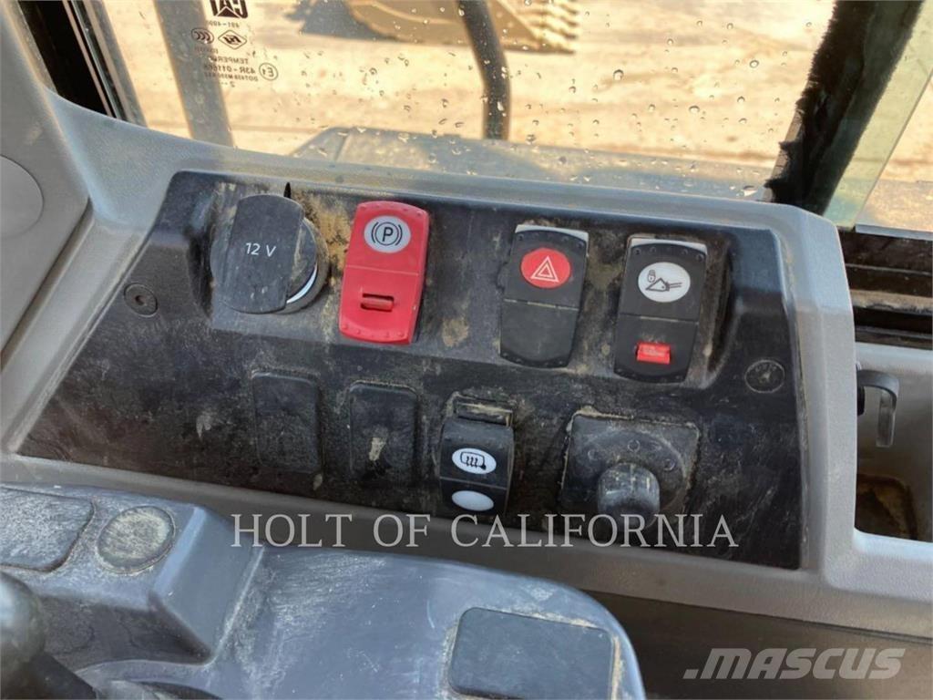 CAT 950M Фронтальные погрузчики