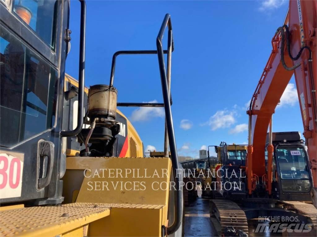 CAT 962M Фронтальные погрузчики