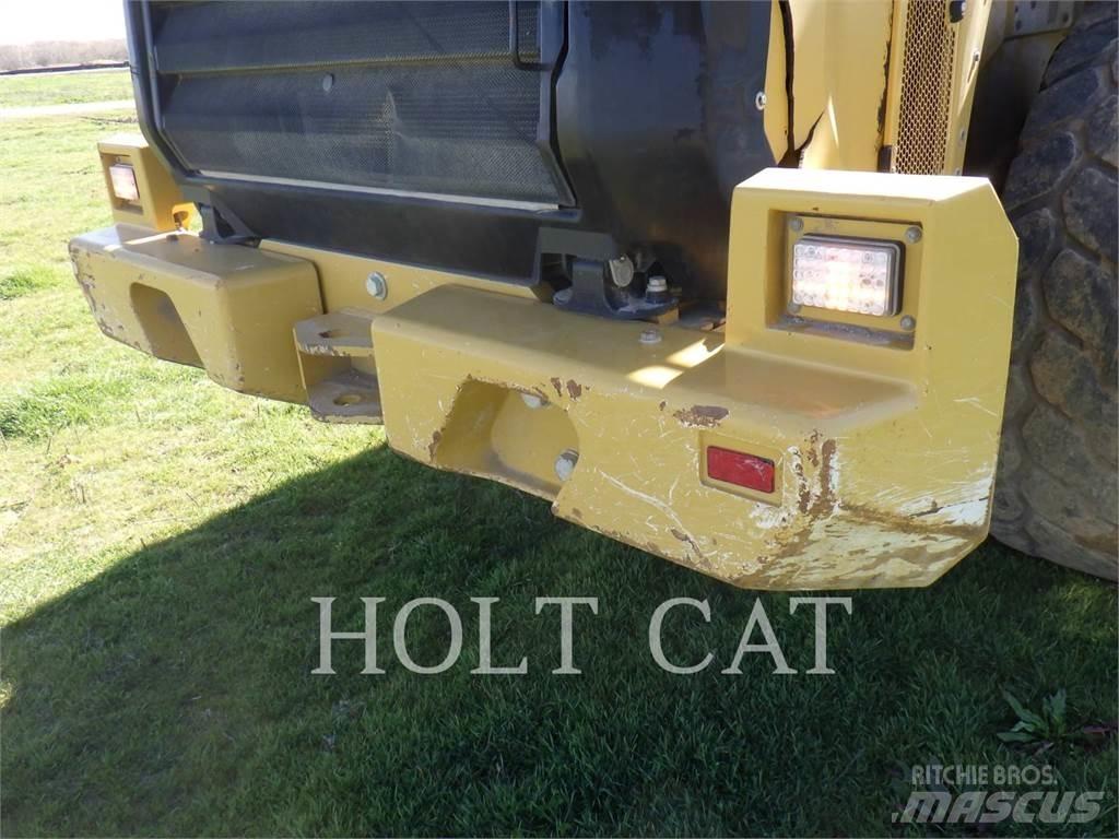 CAT 966M Фронтальные погрузчики