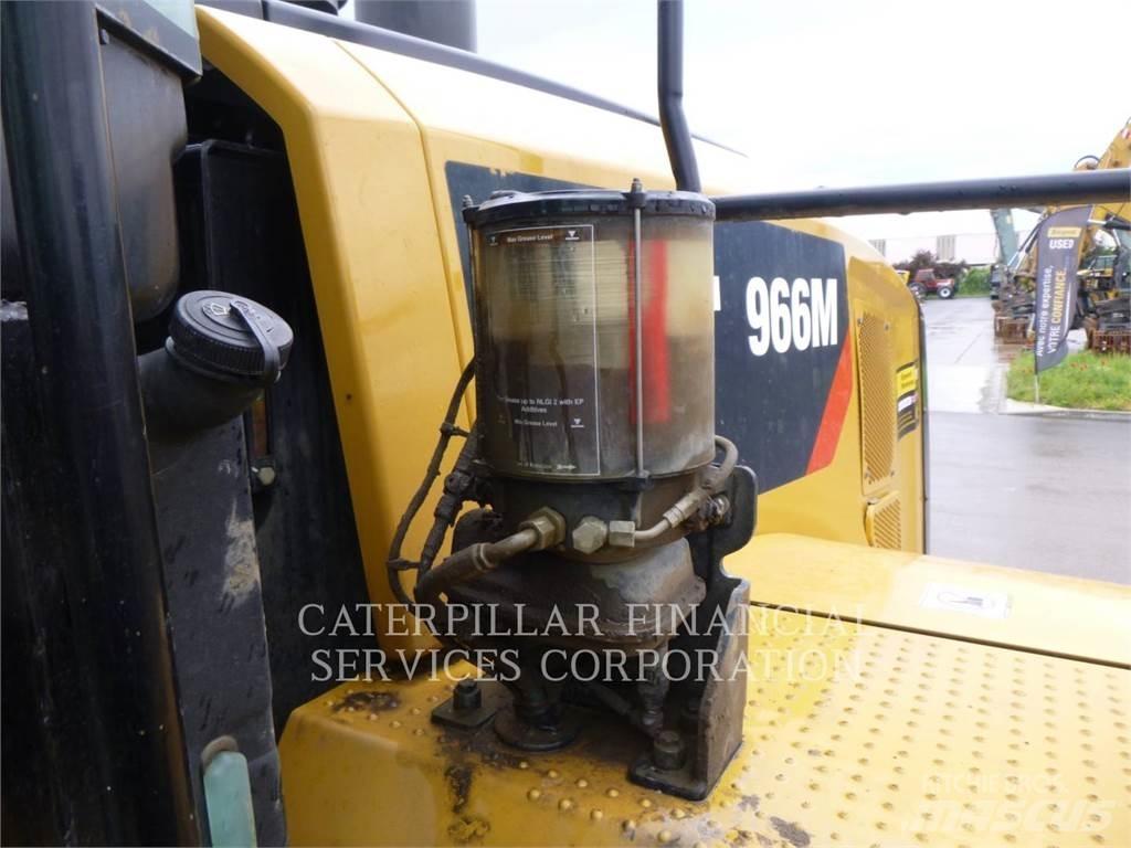 CAT 966M Фронтальные погрузчики