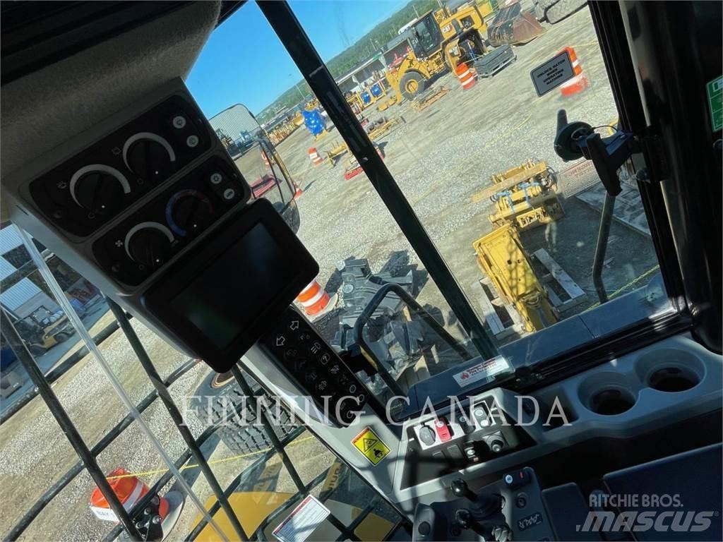 CAT 966M Фронтальные погрузчики