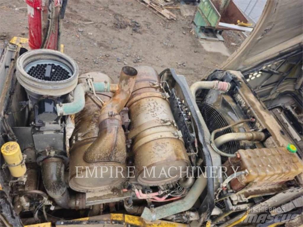 CAT 966M Фронтальные погрузчики