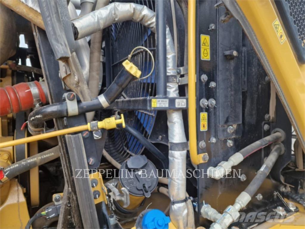 CAT 966M Фронтальные погрузчики
