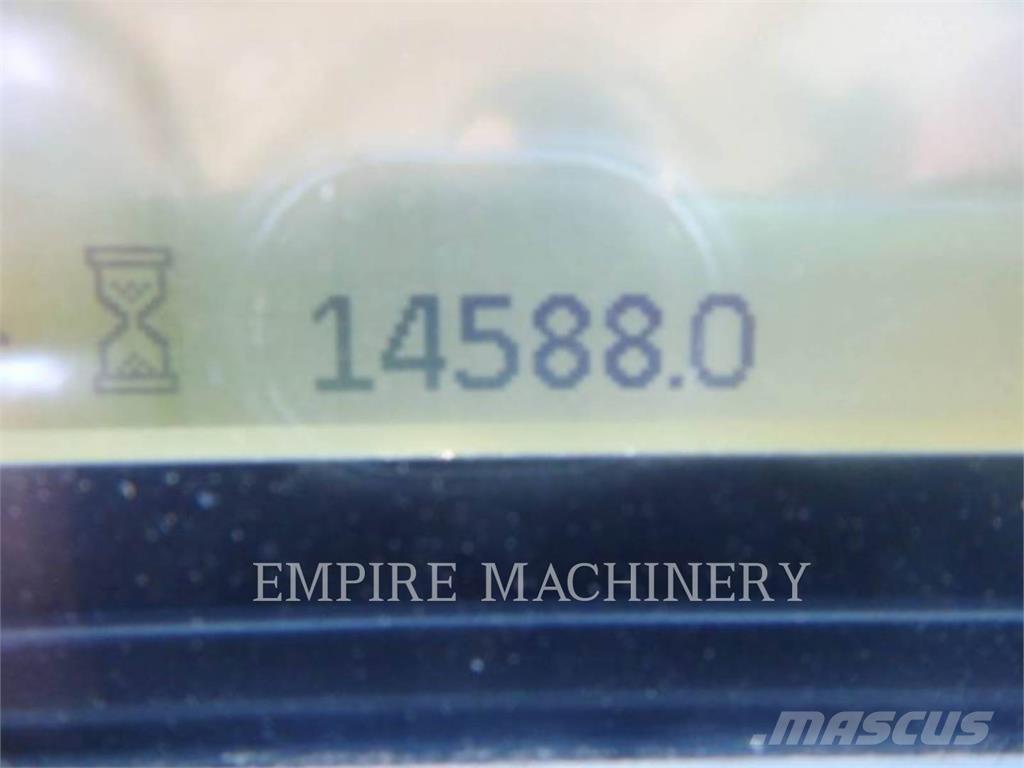 CAT 966M Фронтальные погрузчики