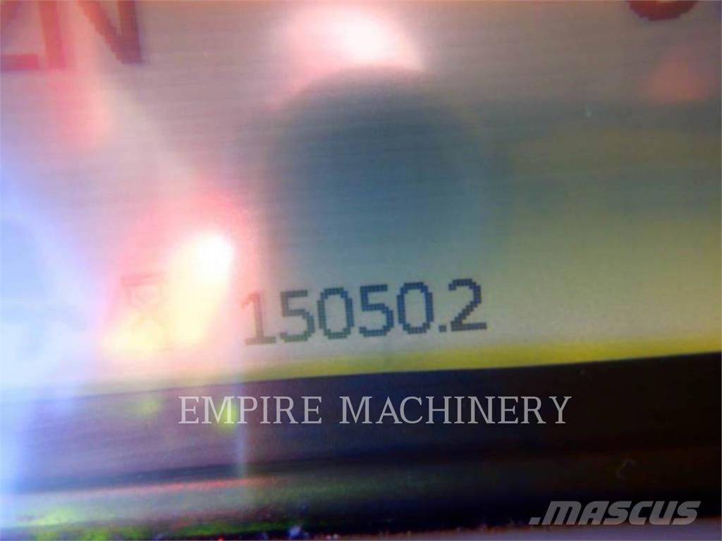 CAT 966M Фронтальные погрузчики