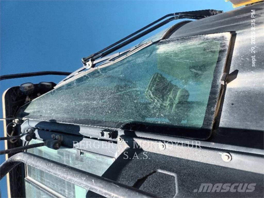 CAT 966M Фронтальные погрузчики