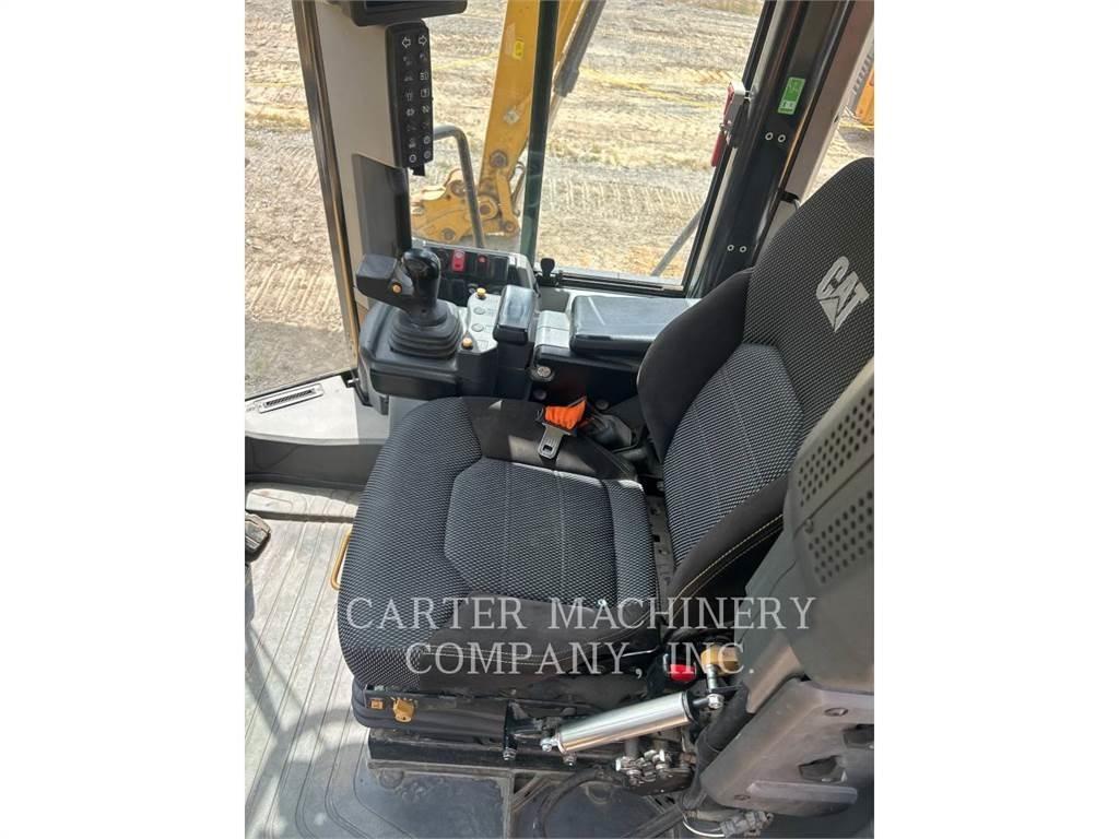 CAT 966M 2V Фронтальные погрузчики