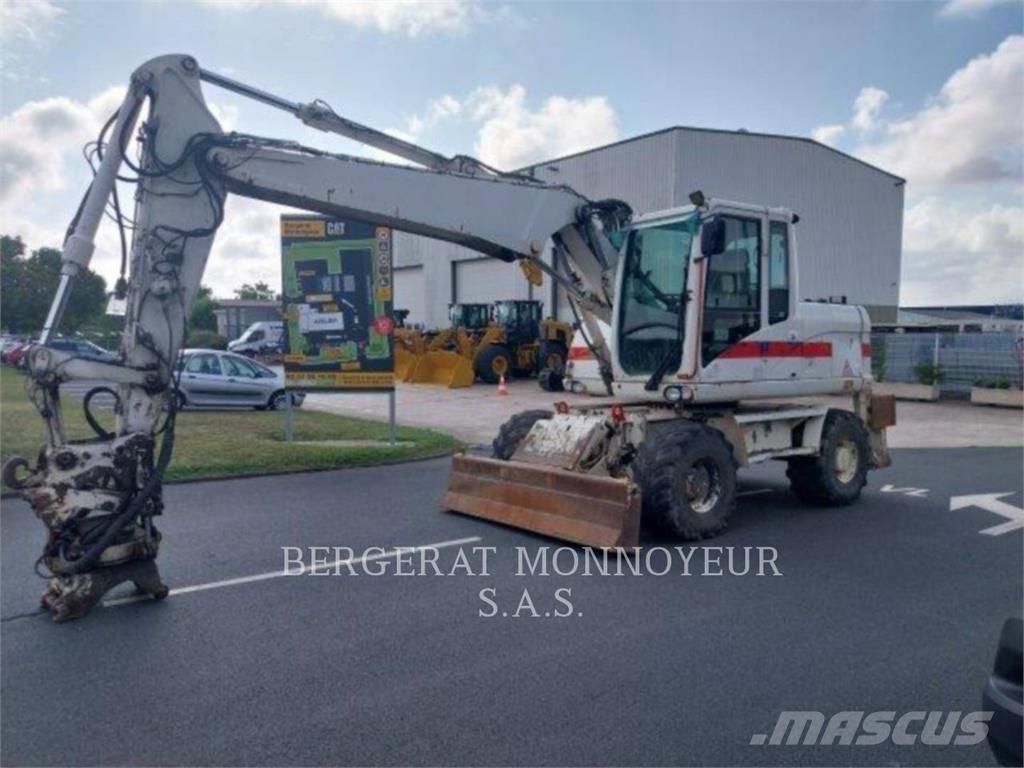 CAT M313D Колёсные экскаваторы