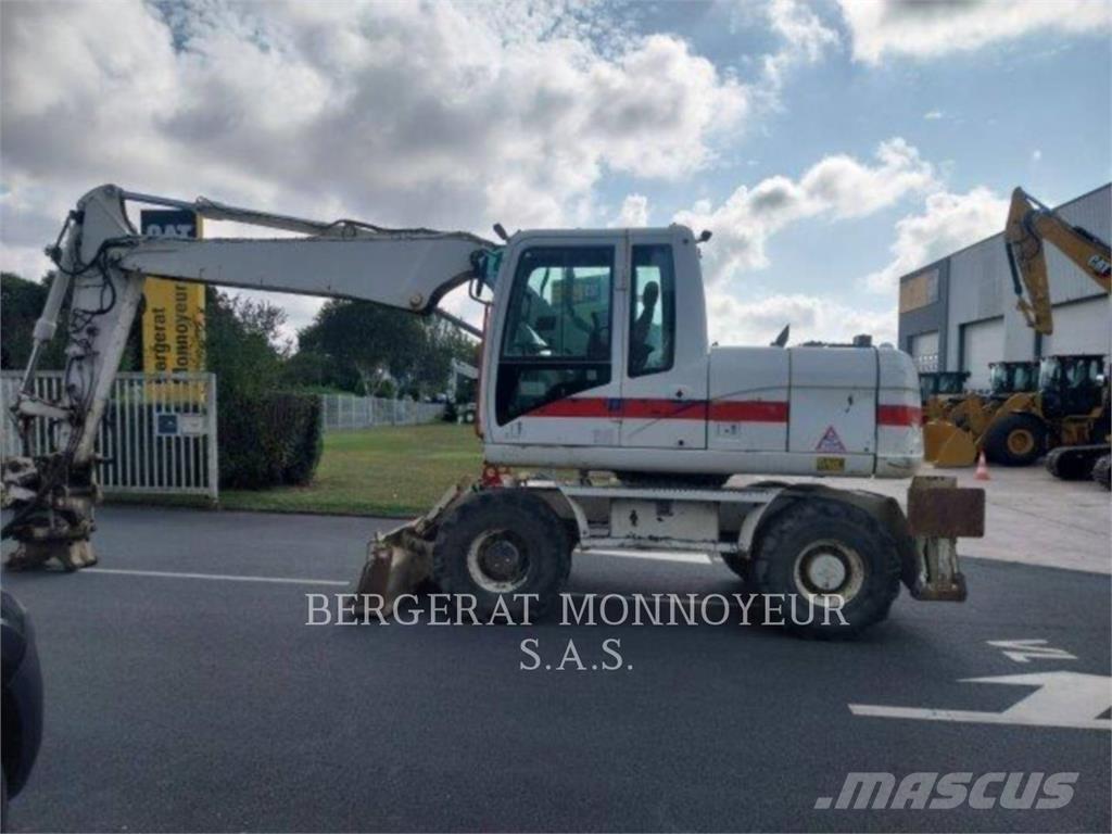 CAT M313D Колёсные экскаваторы