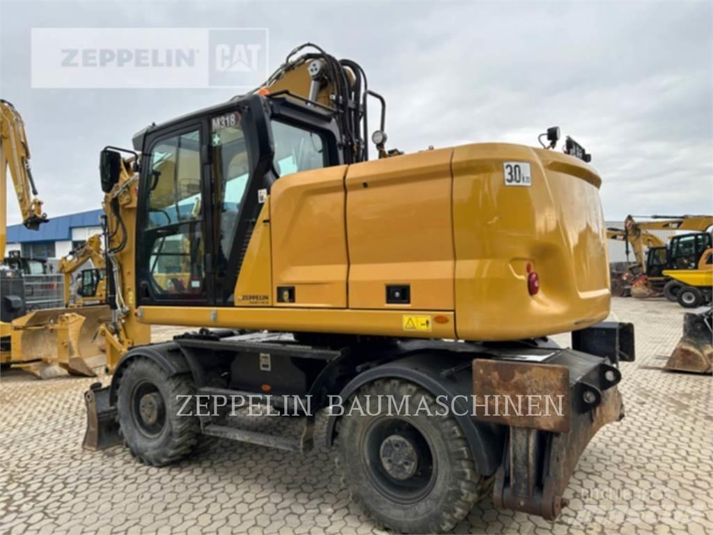 CAT M318-07A Колёсные экскаваторы