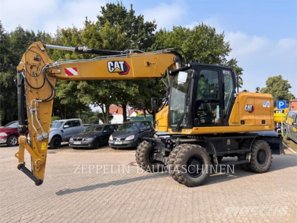 CAT M318-07A Колёсные экскаваторы