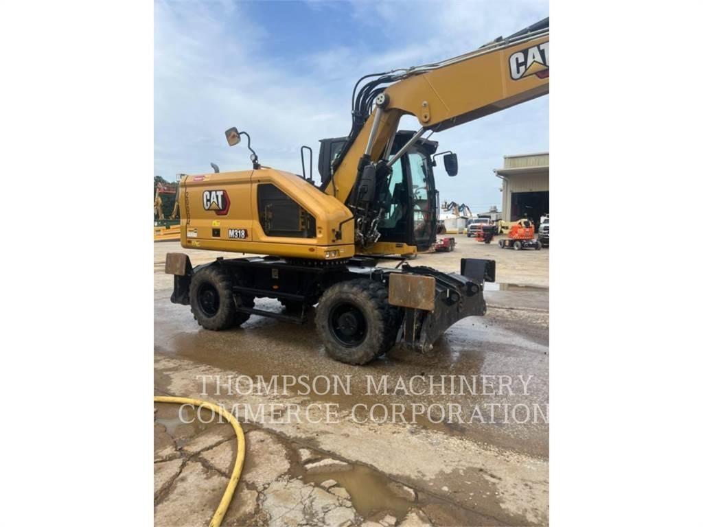 CAT M31807 Колёсные экскаваторы