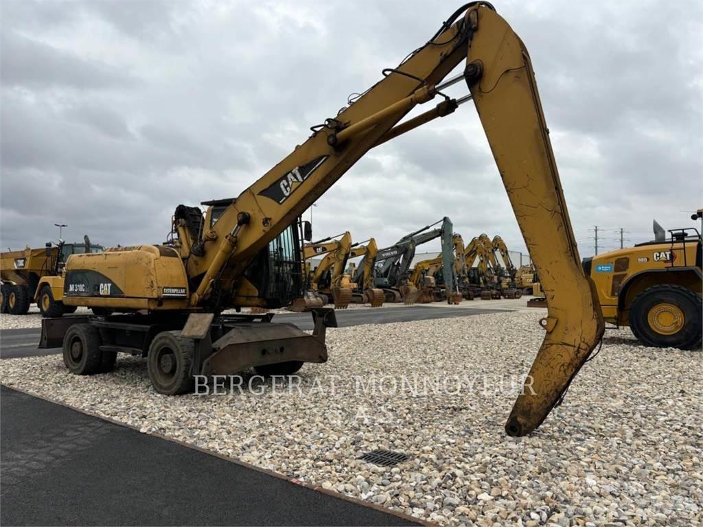 CAT M318C Колёсные экскаваторы