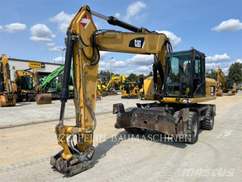 CAT M318D Колёсные экскаваторы